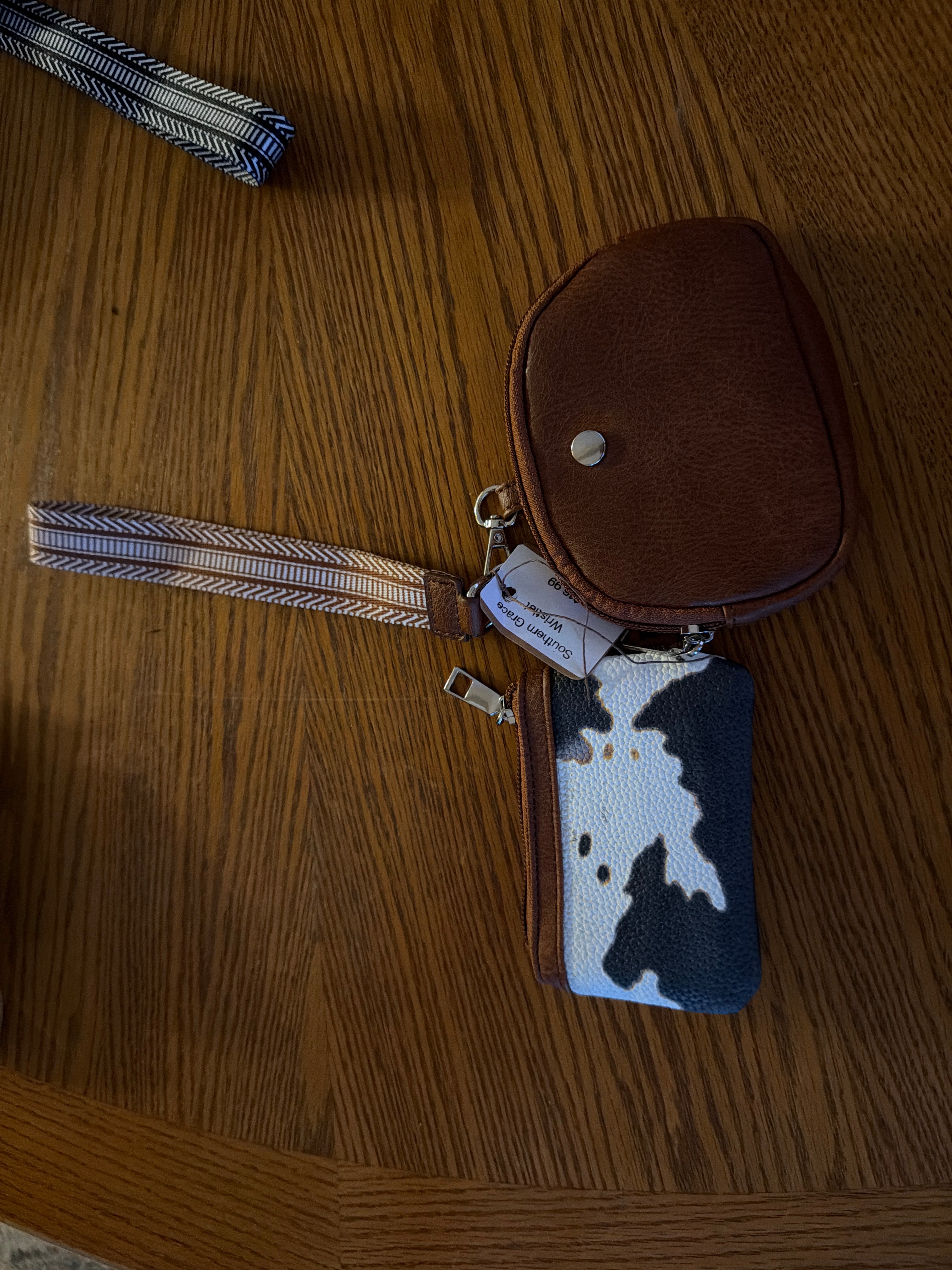 Brown cow print wristlet