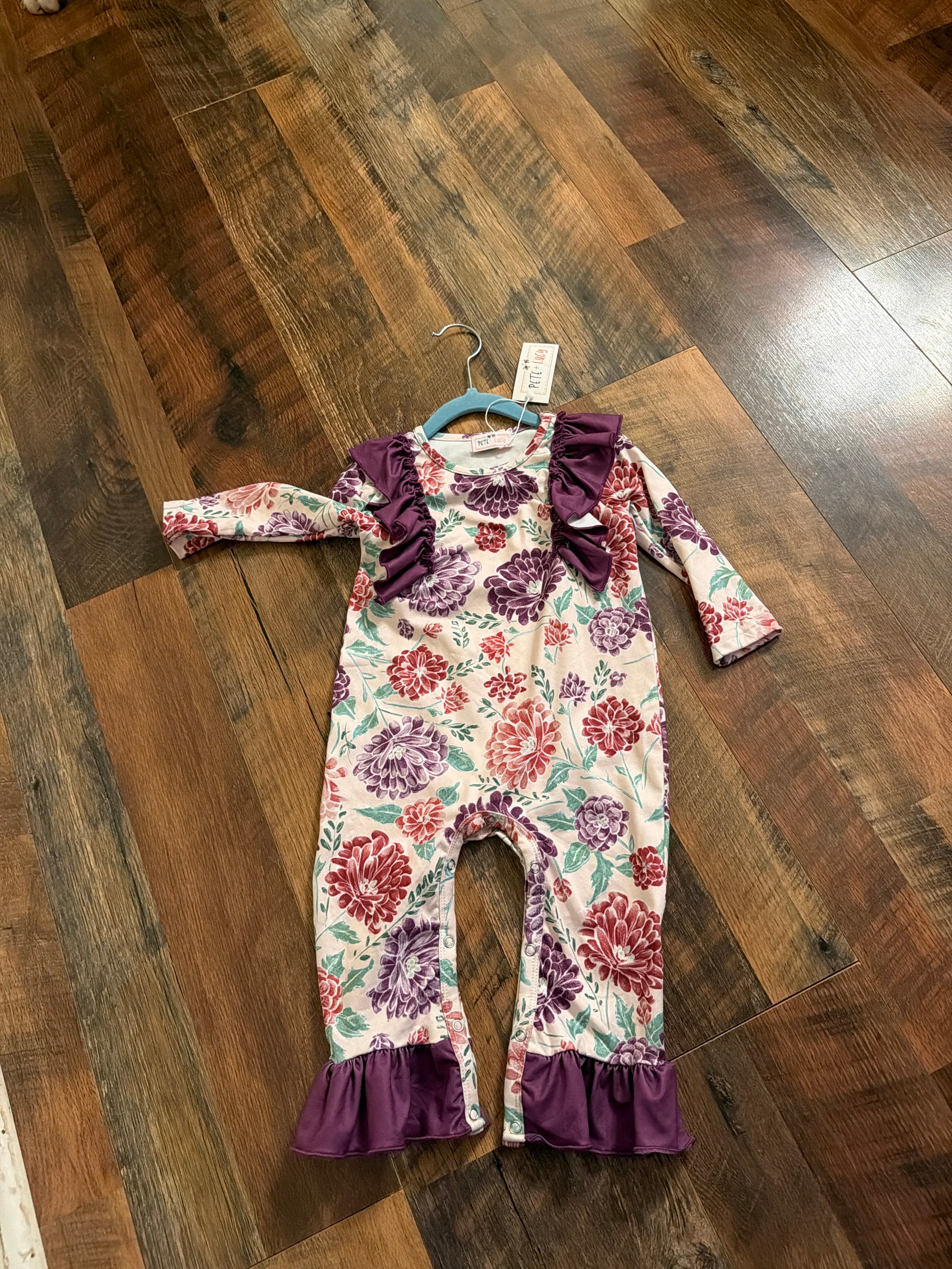 Purple floral ruffle romper